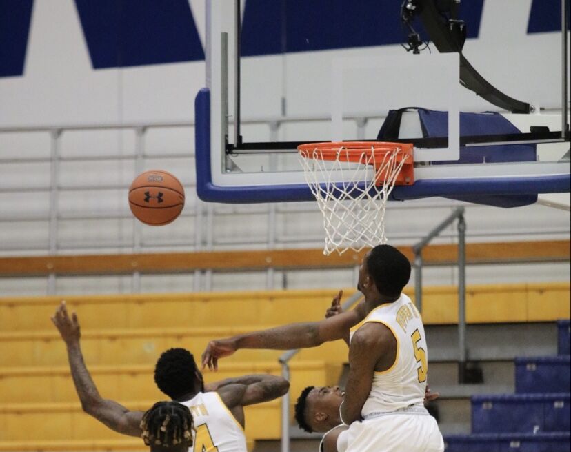 Danny Pippen (5) swats a layup attempt from Point Park University during Kent State’s 90-41 win. Dec. 2, 2020.