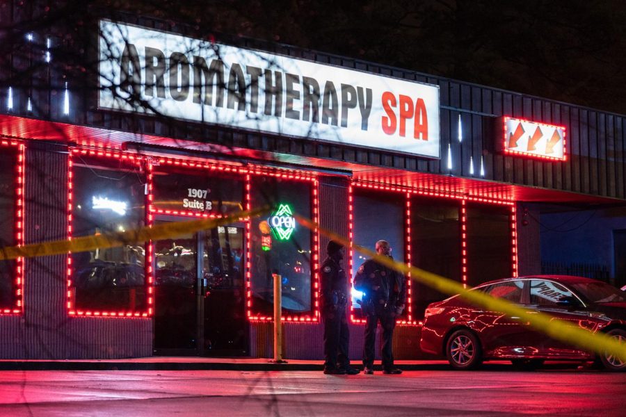 Law enforcement personnel are seen outside a massage parlor where a person was shot and killed on March 16, 2021, in Atlanta, Georgia. - Eight people were killed in shootings at three different spas in the US state of Georgia on March 16 and a 21-year-old male suspect was in custody, police and local media reported, though it was unclear if the attacks were related. (Photo by Elijah Nouvelage / AFP) (Photo by ELIJAH NOUVELAGE/AFP via Getty Images)