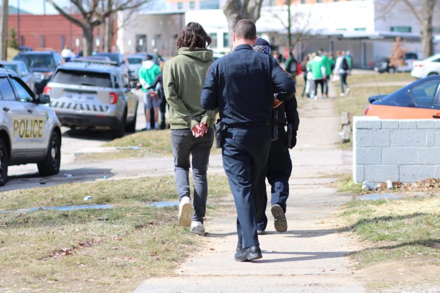 Fake Paddy's partier arrested on East College Avenue March 13, 2021. 