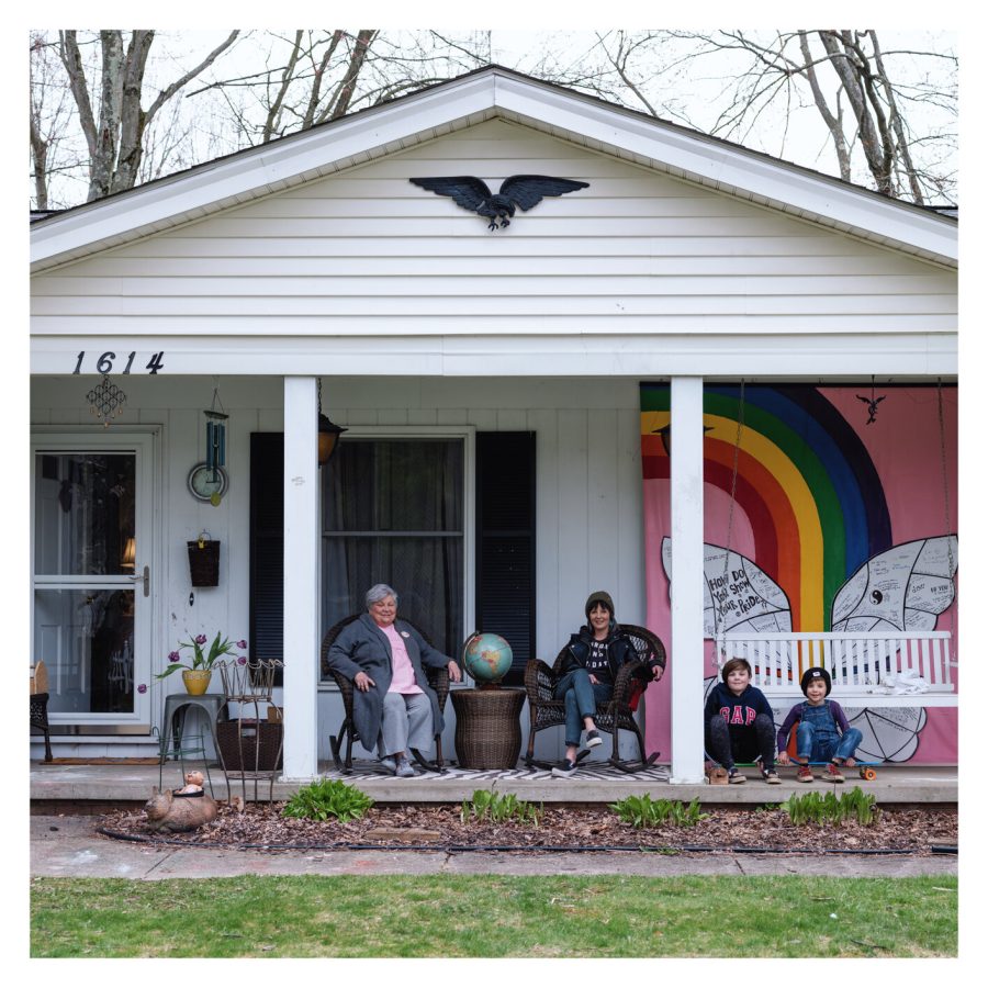 A porch portrait of Suzy D'Enbeau, her mom, Mimi and her kids. 