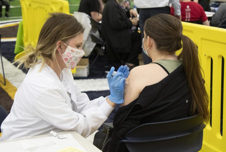 Senior nursing student Courtney Shutt administers the first dose of the Moderna vaccine to senior sport administration major Ginny Weavill on March 30, 2021. Following April 13’s recommendation by the Centers for Disease Control and Prevention (CDC) and the Food and Drug Administration (FDA) to pause the administration of the Johnson &amp; Johnson single-dose COVID-19 vaccine, Kent State paused the distribution of this vaccine to students, which began April 8. 