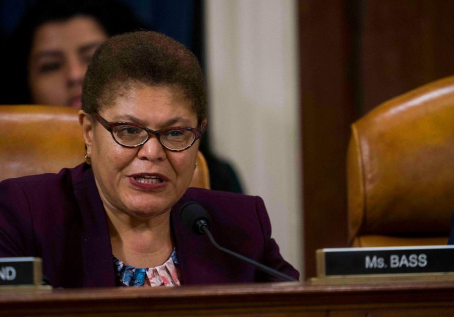 WASHINGTON, DC – DECEMBER 09: Rep. Karen Bass (D-CA) questions Intelligence Committee Minority Counsel Stephen Castor and Intelligence Committee Majority Counsel Daniel Goldman during the House impeachment inquiry hearings in the Longworth House Office Building on Capitol Hill December 9, 2019 in Washington, DC. The hearing is being held for the Judiciary Committee to formally receive evidence in the impeachment inquiry of President Donald Trump, whom Democrats say held back military aid for Ukraine while demanding they investigate his political rivals. The White House declared it would not participate in the hearing. (Photo by Doug Mills-Pool/Getty Images)