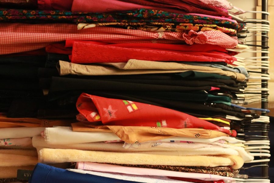 Colorful clothing hangs on the racks at Einstein's Attic. 