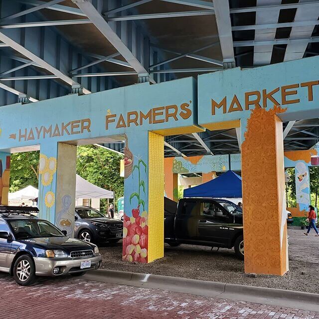 Art that doubles as a sign for Haymaker Farmers' Market Website.