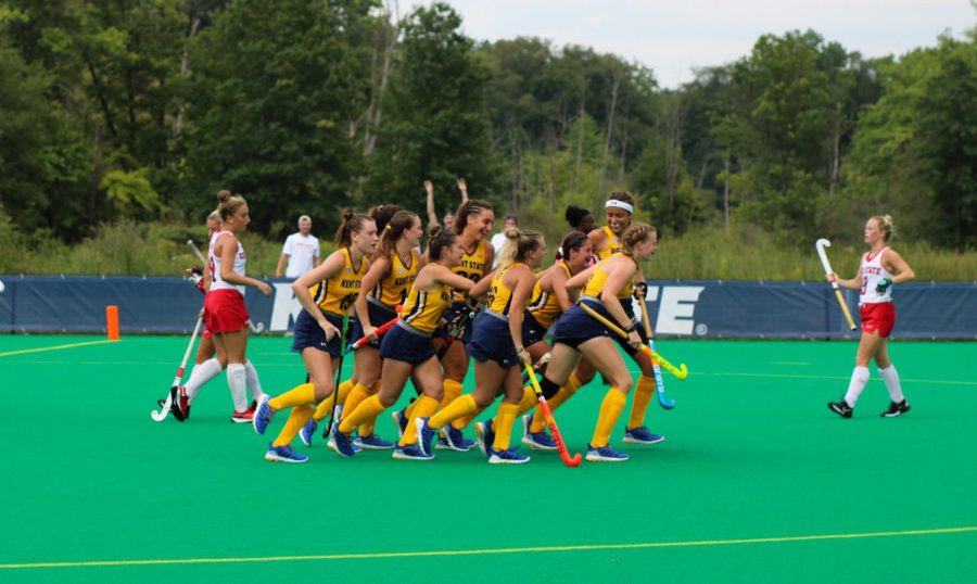 Kent State's field hockey team runs down the field on Tuesday, Aug. 31 after scoring a goal against OSU at Murphy-Mellis Stadium. 