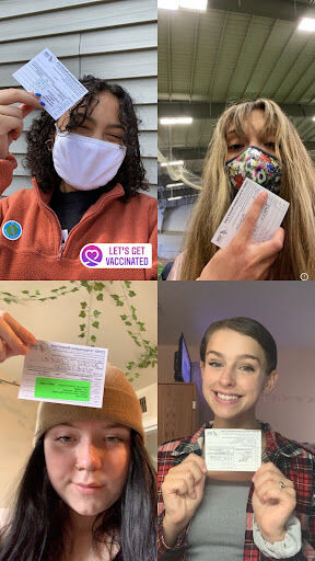 Kent State students posing proudly with their vaccine cards after receiving doses of the COVID-19 vaccination.