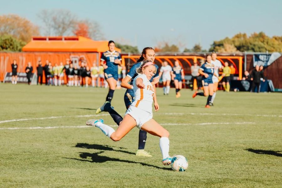 Bowling Green redshirt senior forward Nikki Cox kicks the ball toward the goal during the Mid-American Conference Championship game on Sunday, Nov. 7 in Bowling Green, Ohio. 