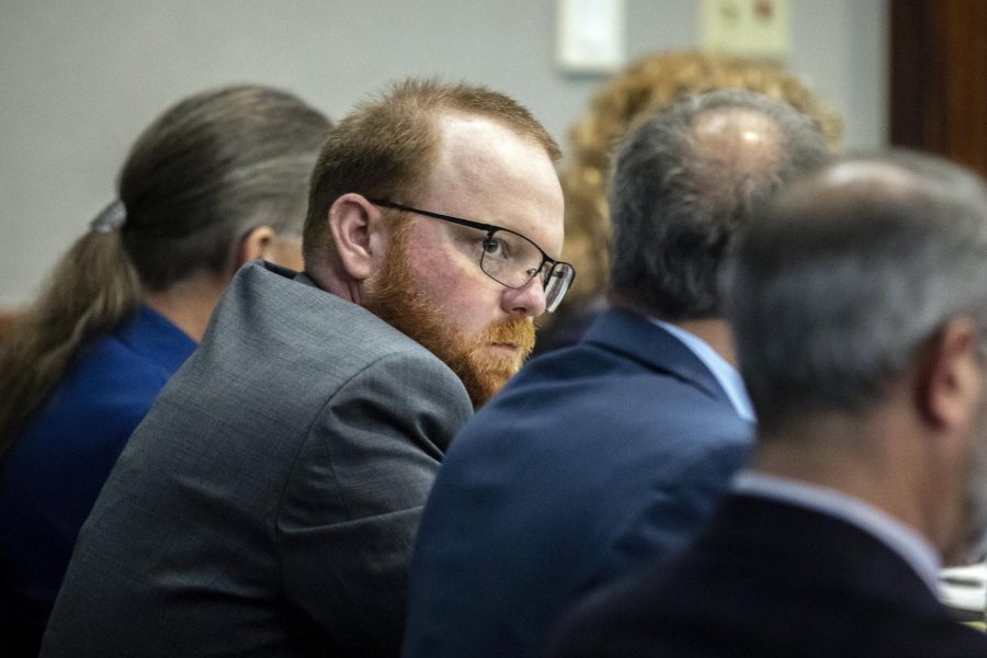 Travis McMichael listens to testimony in the Ahmaud Arbery killing trial.