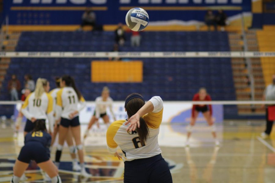 Setter Alex Haffner serves against Miami University on Saturday, Nov. 13 at the MACC.