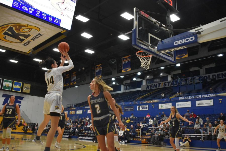 Junior Katie Shumate shoots against John Carrol University, one of many baskets made in the winning game of 101-40 on Wed. Nov. 18, 2021.