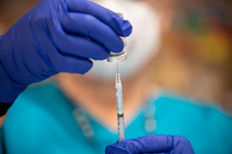 SAN ANTONIO, TX - MARCH 29: A nurse fills up a syringe with the Moderna COVID-19 vaccine at a vaccination site at a senior center on March 29, 2021 in San Antonio, Texas. Texas has opened up all vaccination eligibility to all adults starting today. Texas has had a slower roll out than some states and with the increase in eligibility leaders are hoping more and more citizens get vaccinated. (Photo by Sergio Flores/Getty Images)