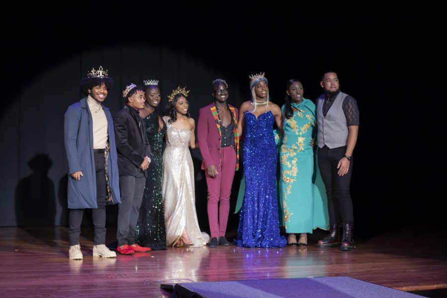 Winners of the Renaissance Ball stand with Program director Taminqua Blackwell (gold dress) and past winners of the ball. Atira Wong won Princess, William Joiner won Prince, Kiara Moore won queen and Julian Grimes won king.