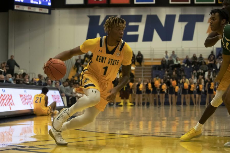 Redshirt freshman forward VonCameron Davis (1) dribbles the ball towards the net during the men's basketball game on Nov. 30, 2021. Kent State beat Point Park University 107-41.