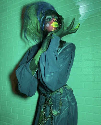 Flatty Patty the Alien in full drag.