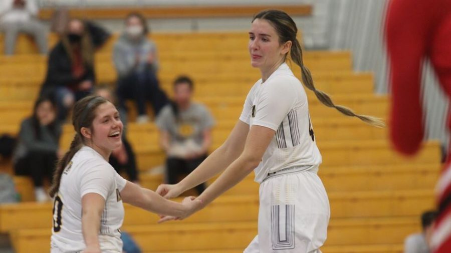 Senior forward Lindsey Thall and sophomore guard Casey Santoro celebrate during the Kent State women's basketball game against Miami at Kent Feb. 7. 