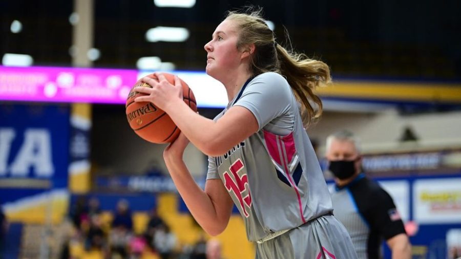 Freshman forward Bridget Dunn prepare to make a shot during the Kent State women's basketball's loss against Bowling Green in Kent, Ohio on Monday, Feb. 21. 