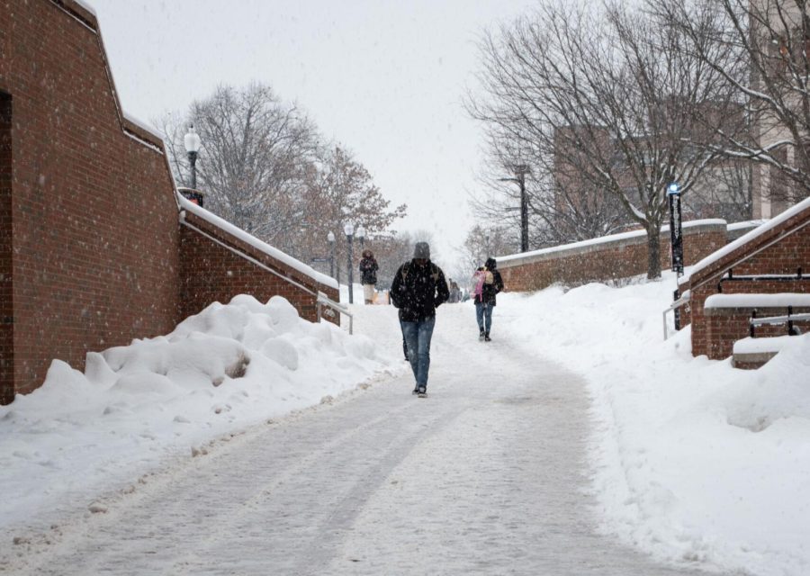 Snow along Kent State's Esplanade melted into a slush, making the sidewalk slick for many students on Monday, Jan. 24, 2022.