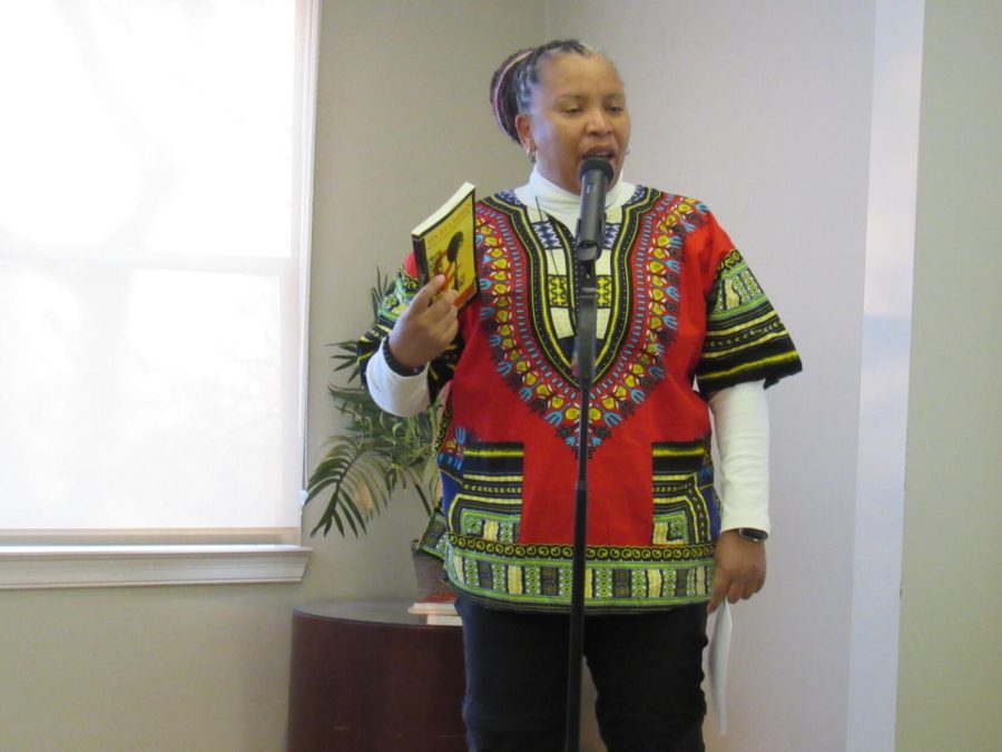 Charmaine Crawford, associate professor of Africana Studies at Kent State, speaks at the "Speaker on the Path: The Words and the Works of bell hooks" event at the Williamson House on Tuesday, Jan. 25, 2022.