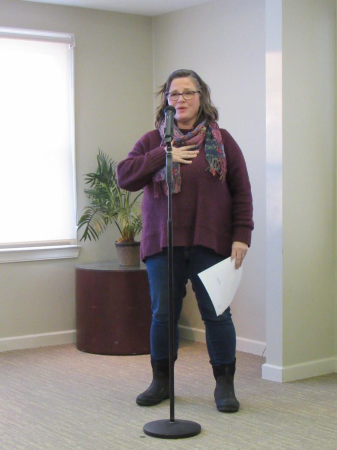 Cassandra Pegg-Kirby, director of the Women's Center, speaks at the "Speaker on the Path: The Words and the Works of bell hooks" event at the Williamson House on Tuesday, Jan. 25, 2022.