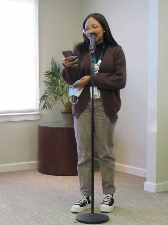 Heaven Brown, a high school senior intern, speaks at the "Speaker on the Path: The Words and the Works of Bell Hooks" event at the Williamson house on Tuesday, Jan. 25, 2022.