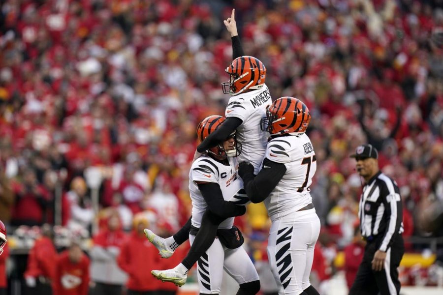 Cincinnati Bengals kicker Evan McPherson (2) celebrates with teammates after kicking a 31-yard field goal during overtime in the AFC championship NFL football game against the Kansas City Chiefs, Sunday, Jan. 30, 2022, in Kansas City, Mo. The Bengals won 27-24. (AP Photo/Eric Gay)