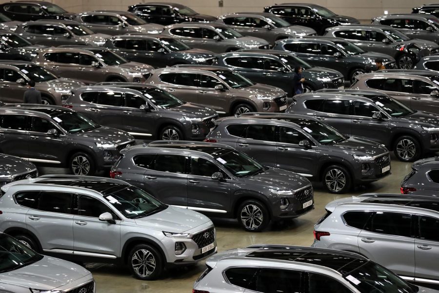 Hyundai Motor Co. Santa Fe sport utility vehicles (SUV) stand on display during a launch event for the updated vehicle in Goyang, South Korea, on Wednesday, Feb. 21, 2018. To recapture buyers in the U.S. who have shunned its sedans and compact cars, Hyundai has said it will bring eight new or redesigned crossovers or SUVs by 2020. Photographer: SeongJoon Cho/Bloomberg via Getty Images