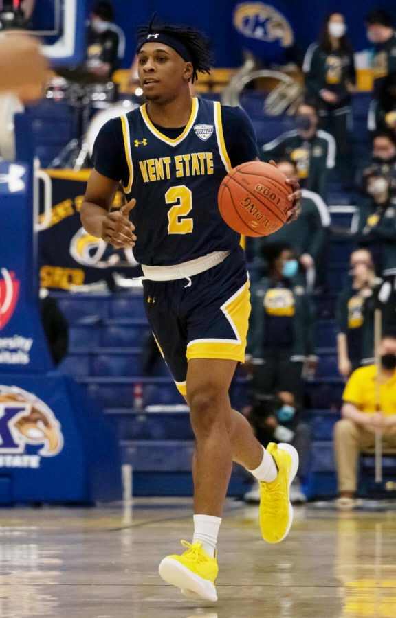 Redshirt junior guard Malique Jacobs (2) dribbles the ball down the court during the men's basketball game against Western Michigan University on Jan. 25, 2022. Kent State beat Western Michigan 75-64.