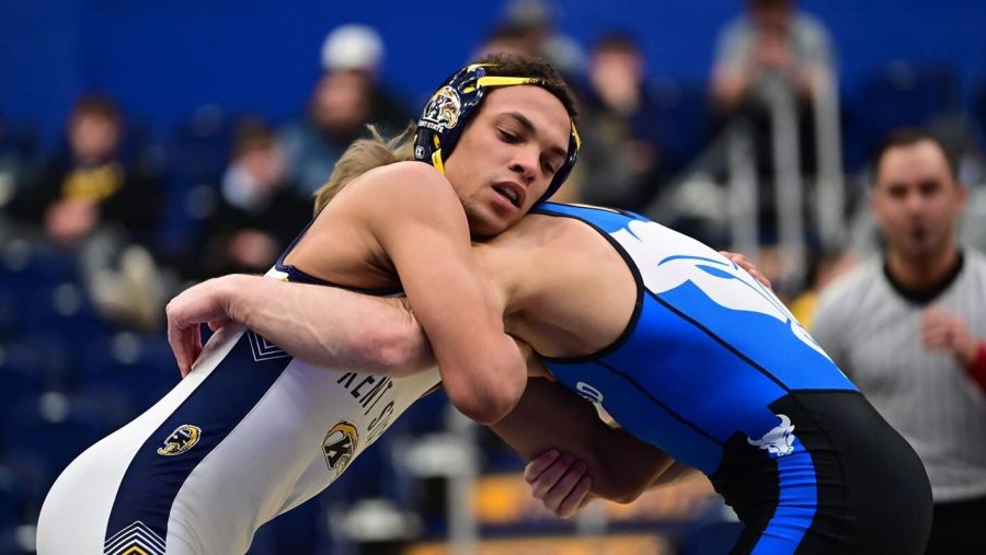 Redshirt sophomore Louis Newell wrestles during the Kent State wrestling team's meet against Buffalo in Kent, Ohio on Sunday, Jan. 23. 