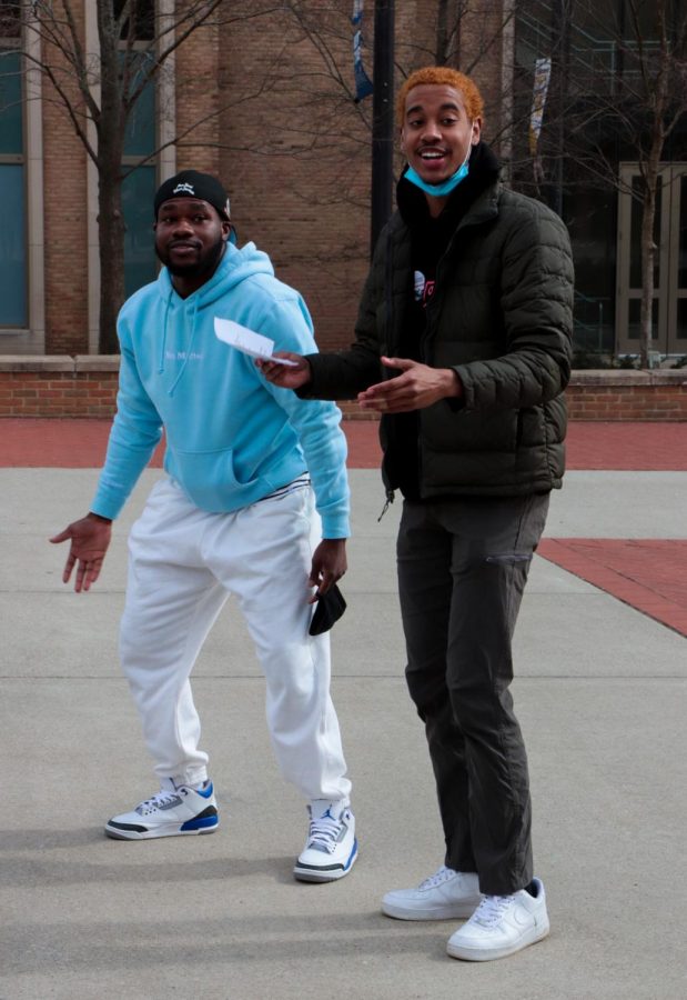 AJ and Aaron, two protestors from the crowd, lead a song about freedom fighters at the protest against house bill 327, lead by Black United Students on Wednesday, March 9.