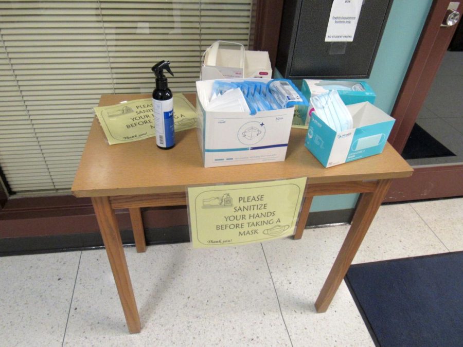 The table of free masks located on the first floor of Satterfield Hall, the English building.