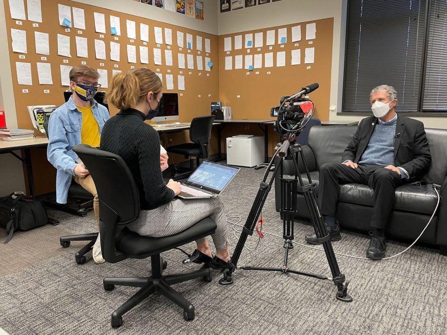 Freshman journalism major Alton Northup and junior journalism major Baylee Sweitzer interview Sen. Sherrod Brown Monday. President Joe Biden campaigned about forgiving student loan debt before entering presidency.