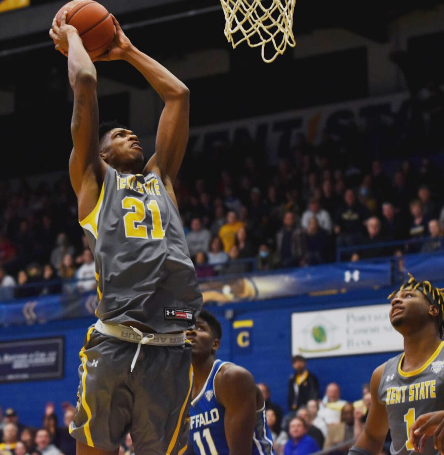 Kent Sate redshirt senior Justyn Hamilton leaps for a slam dunk during the game on March 3, 2022.