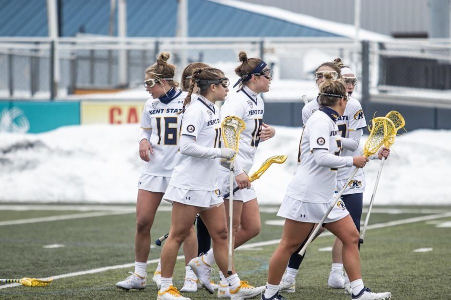 Members of the Kent State lacrosse team gather during its game against Cincinnati on Friday, March 4 in Kent, Ohio.  