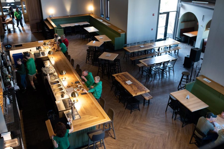 Customers order drinks and dinner at Bell Tower Brewing Co. on St. Patrick's Day.