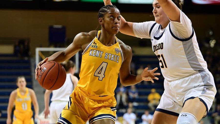 Junior forward Nila Blackford makes a move toward the basket during the Kent State women's basketball team's loss to Toledo in the second round of the WNIT in Toledo, Ohio on Monday, March 21