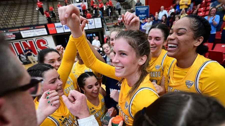 The Kent State women's basketball team celebrates its win over Youngstown State University in the first round of the WNIT in Youngstown, Ohio March 16. 