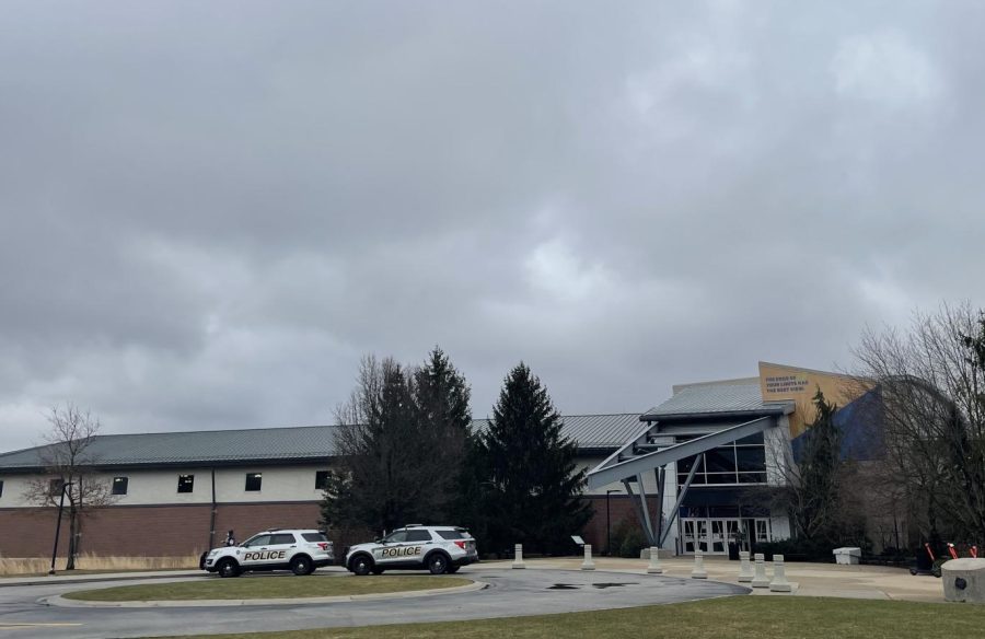 Kent City Police wait outside of the Student Recreation and Wellness Center after the rumor of a threat spread on social media.