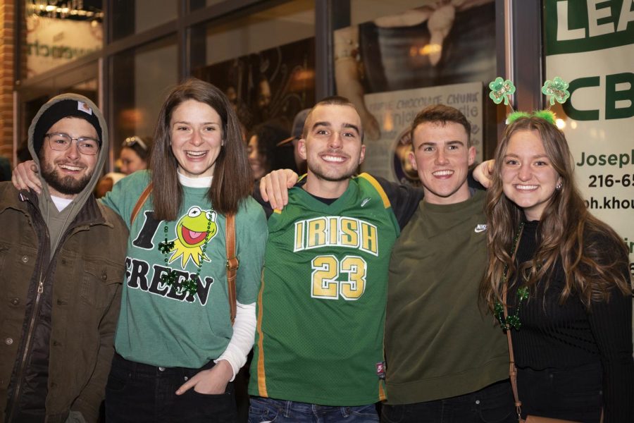 A group of friends wait in line for Barfly while they celebrate Kent's Fake Paddy's Day on March 12, 2022.