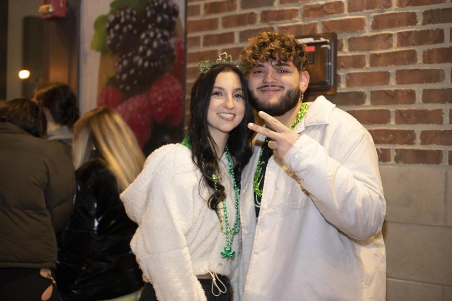 Public health major Megan Torres (left) waits in line for Barfly with her boyfriend Dylan Baker on Fake Paddy's Day. 