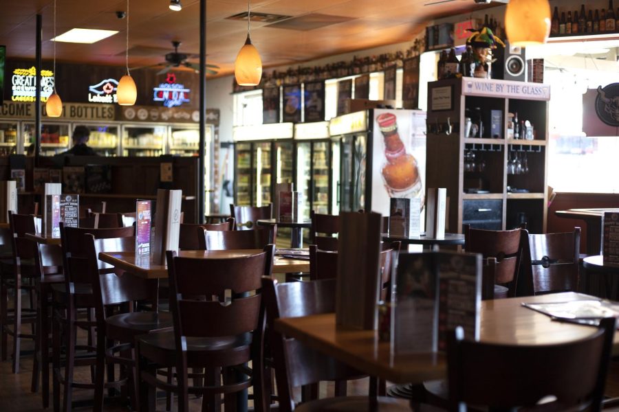 The bar area inside 101 Bottle of Beer on the Wall. 101 Bottles of Beer on the Wall is located at 115 North Willow Street in Kent, Ohio.