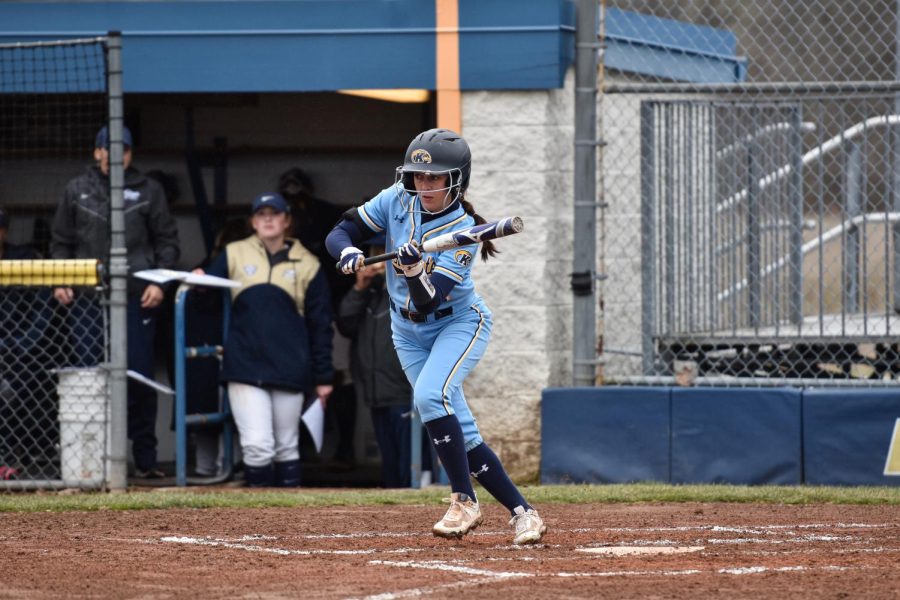 Kent State senior Brooklyn Whitt goes for a bunt.