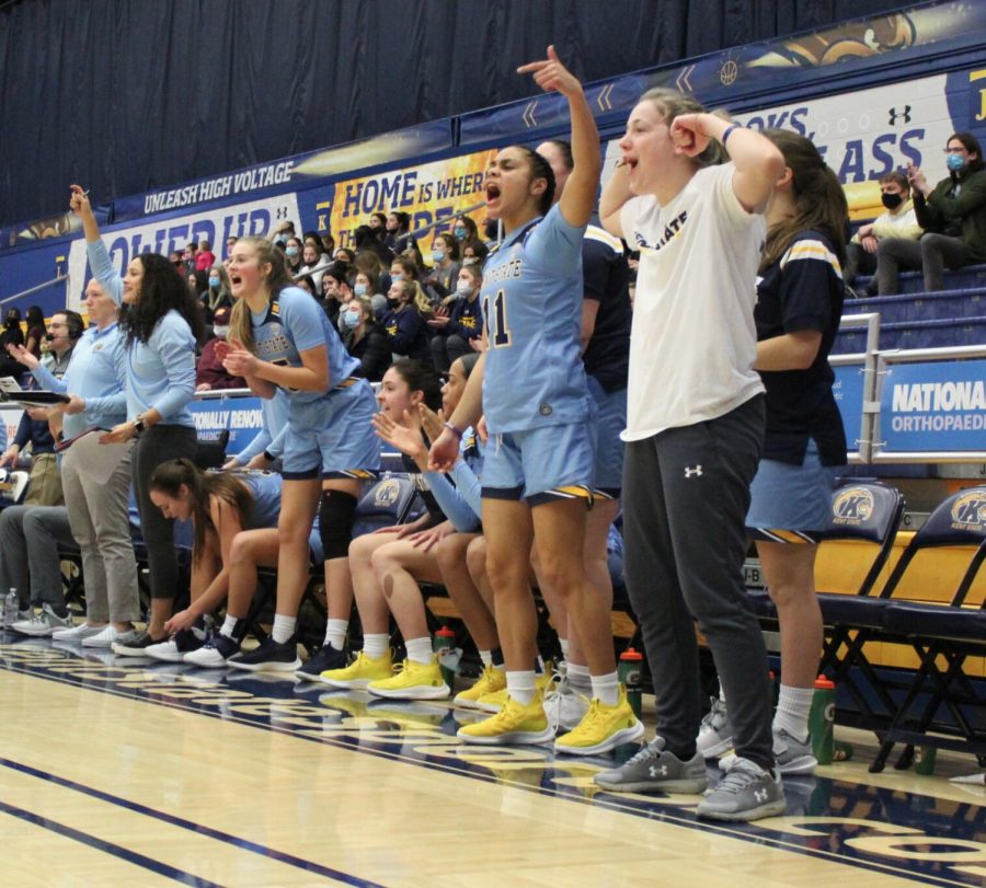 Team cheers on the sidelines as Kent scores again on Wed. Feb. 2, 2022 against Central Michigan University. The final score was 68-57 Kent.  