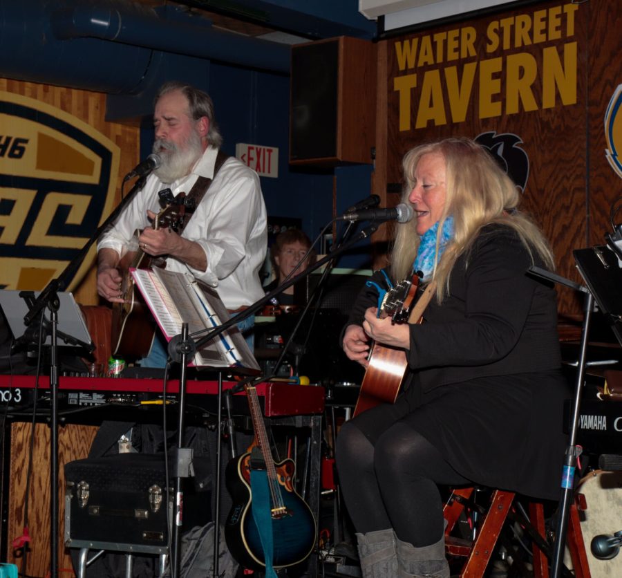 The band "Up 'Til 4" plays at the Water Street Tavern for a crowd in downtown Kent at the Beatle Fest on Friday, Feb. 18. They play acoustic rock covers putting emphasis on bands like the Beatles.