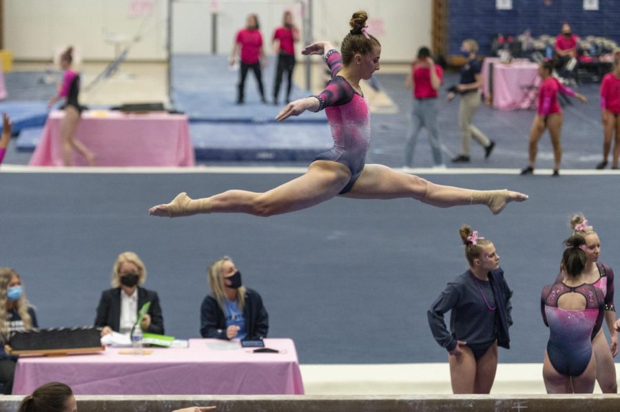 Kent State senior Sarah Haxton warms up on beam during the gymnastics competition against Bowling Green at the M.A.C. Center on Feb. 20, 2022.