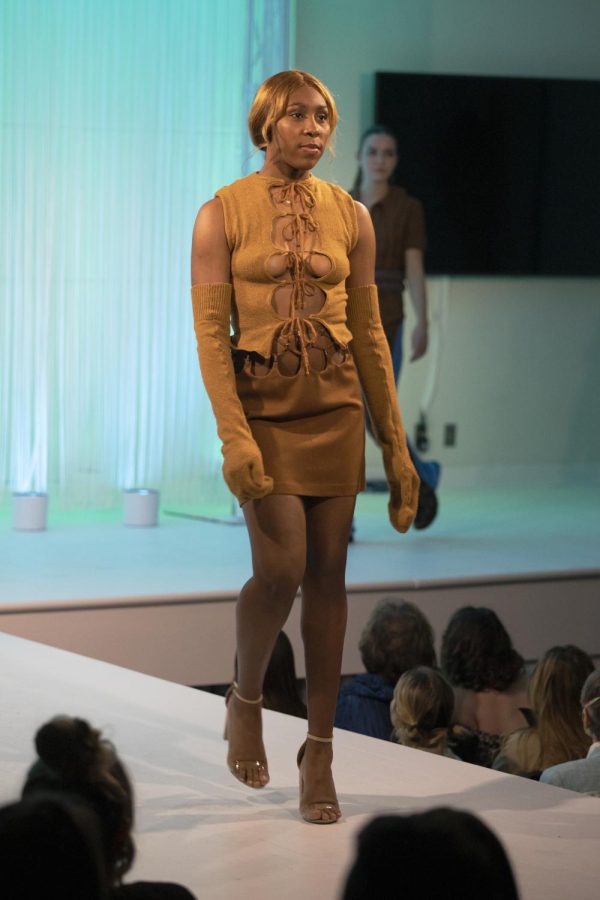 Mikeyla Parker models Savanna Wills collection during the annual fashion show on April 28, 2022.