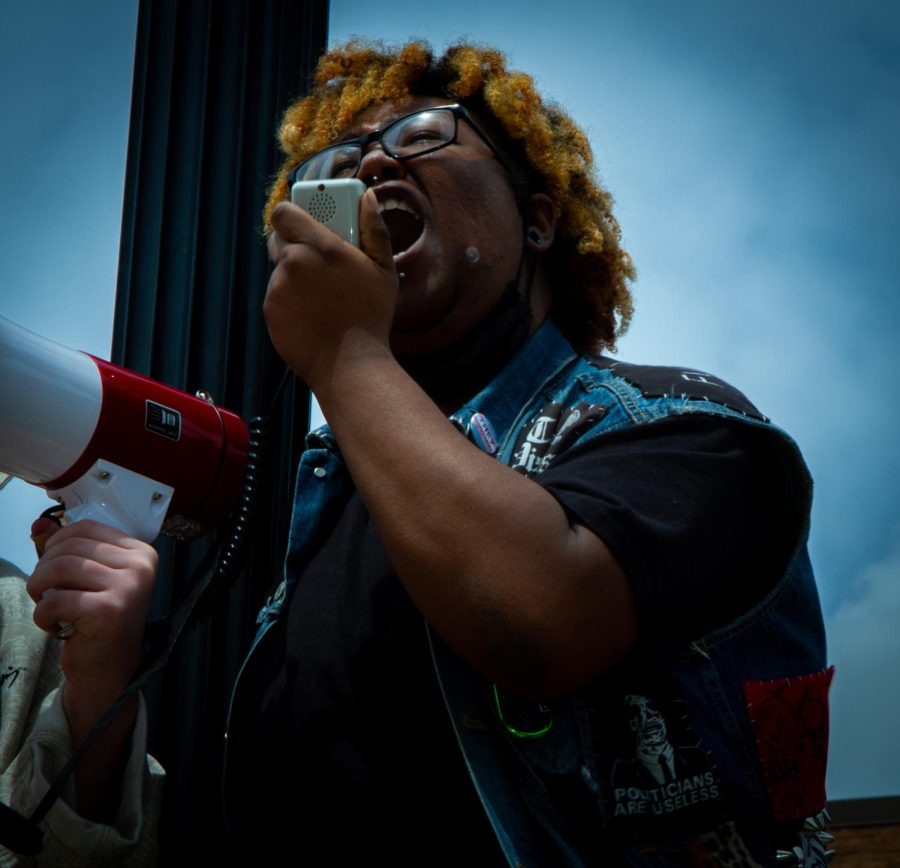 Graham, a Kent State student, speaks to the crowd on the K at the pro-choice rights protest on Thursday, May 5. Graham says as a Black trans person the government is constantly trying to take their rights, and they would rather die than let that happen.