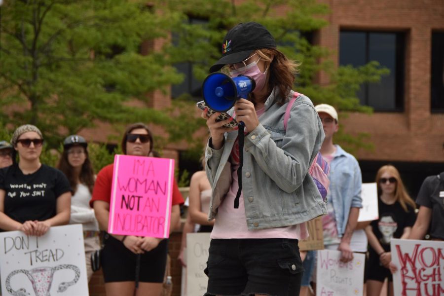 Organizer of the protest, Autumn Pritchard, speaks to the crowd. "It is not a new era in which the statement of 'land of the free' will ring true anymore, if it had even at all, for anyone who is not a cisgendered, white, rich male," she said.