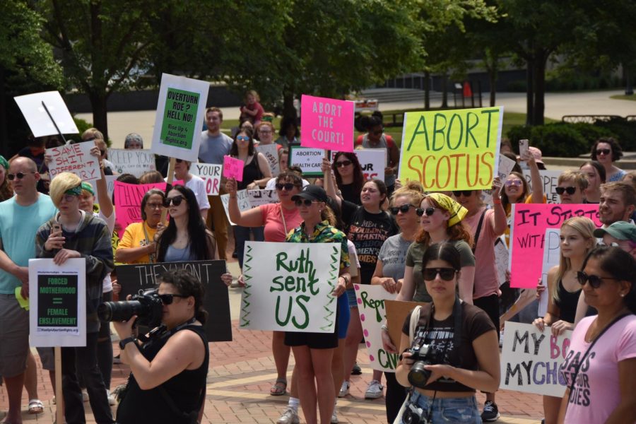 Students and local residents gather during a protest that marched from the K on Risman Plaza to the Portage County Municipal Courthouse. Most of the crowd heard about the protest through social media.