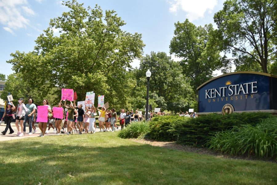 Protesters march from Risman Plaza to the Portage County Municipal Courthouse.