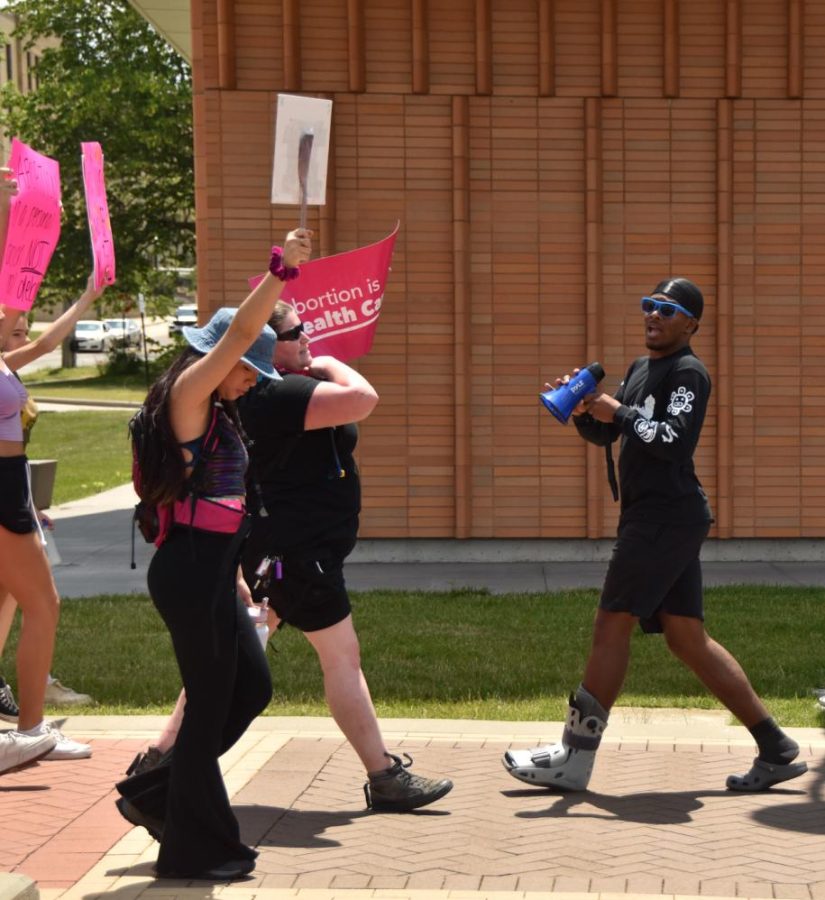 RJ Whitefield-Tucker led chants on the bullhorn and encouraged protestors to continue on.